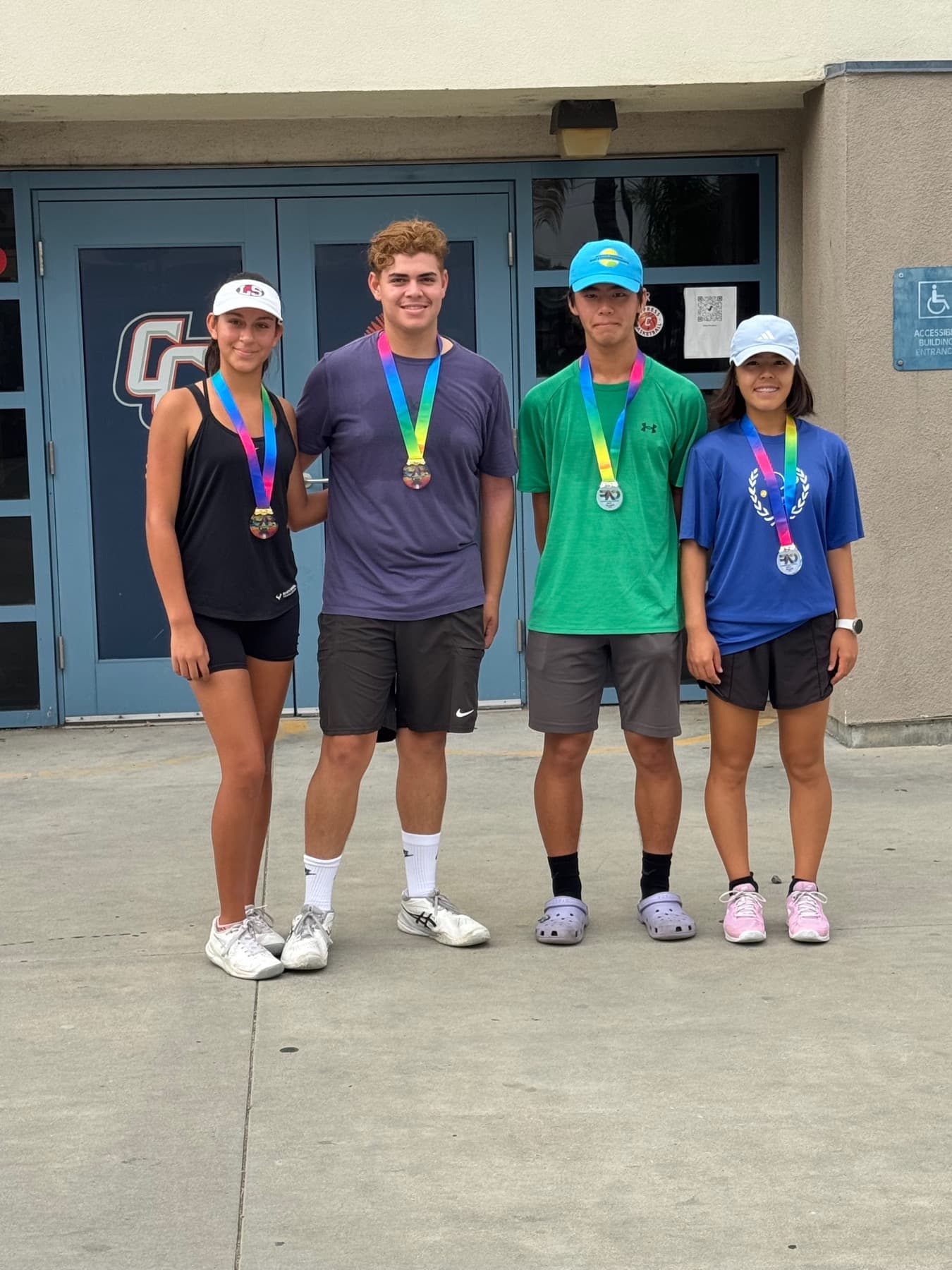 Players wearing medals after competition